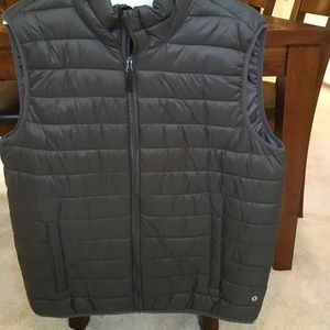 Lightweight but warm vest. Mens size large charcoal grey